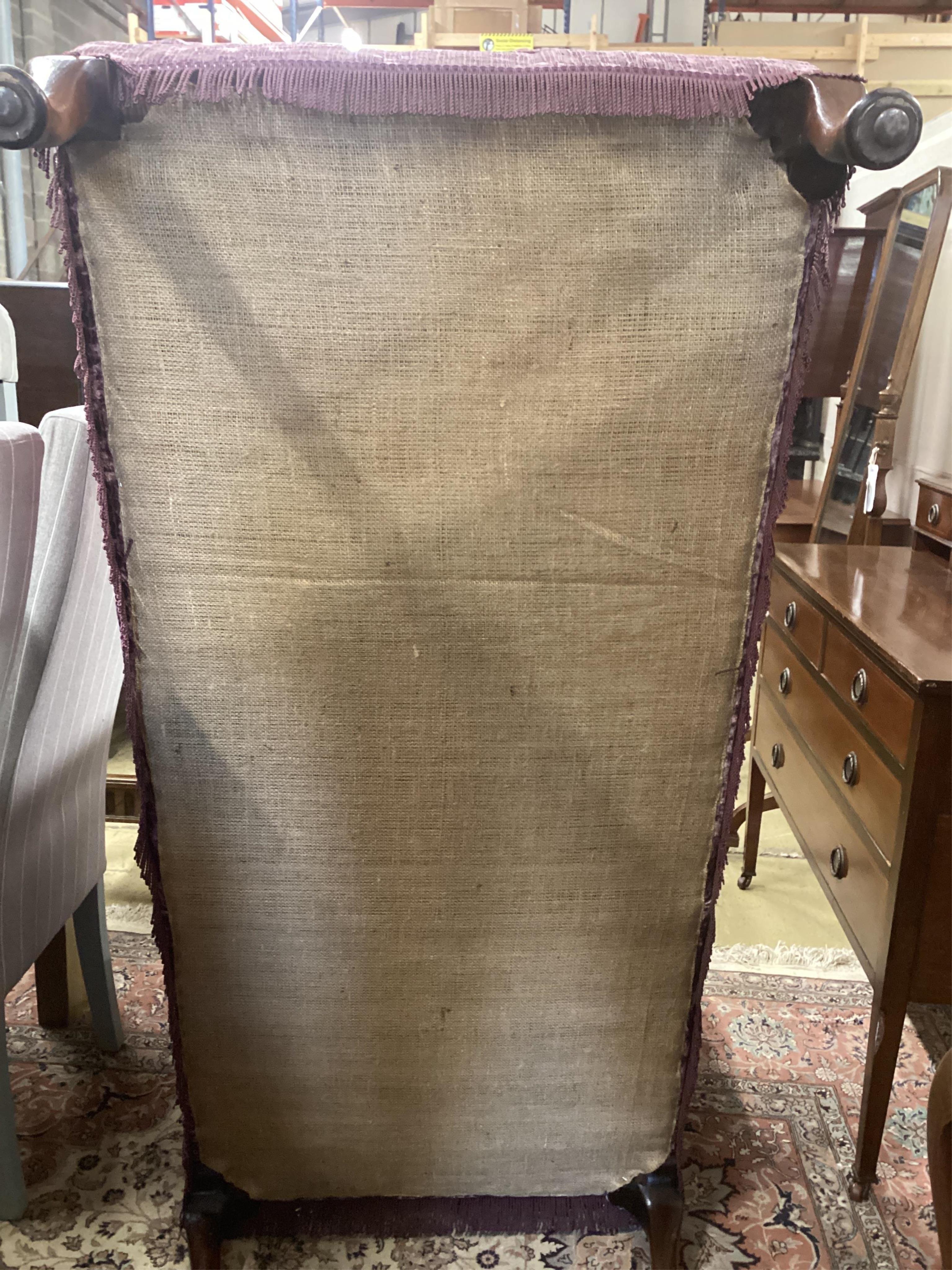 An early 20th century day bed, re-upholstered in contemporary buttoned purple fabric, width 160cm, depth 67cm, height 84cm. Condition - good